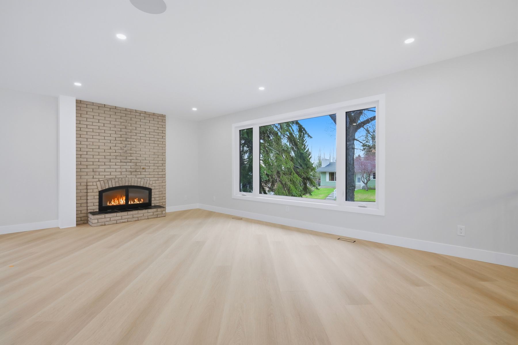 Living room — alternate angle, fire lit